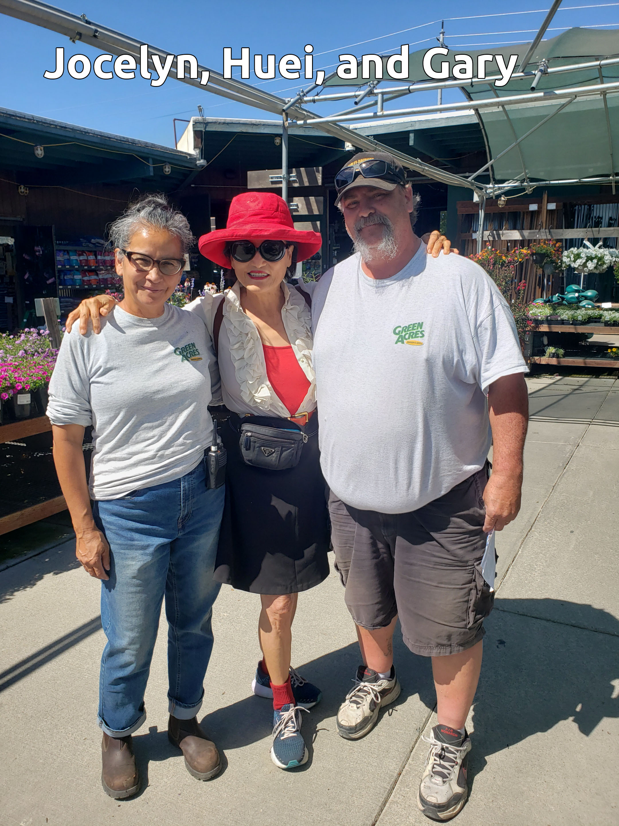 Huei with two Green Acres team members